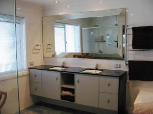large bathroom custom cut horizontal vanity mirror Hopkins Glass and Shower Door