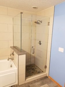 frameless glass shower door with panel and 90 degree return